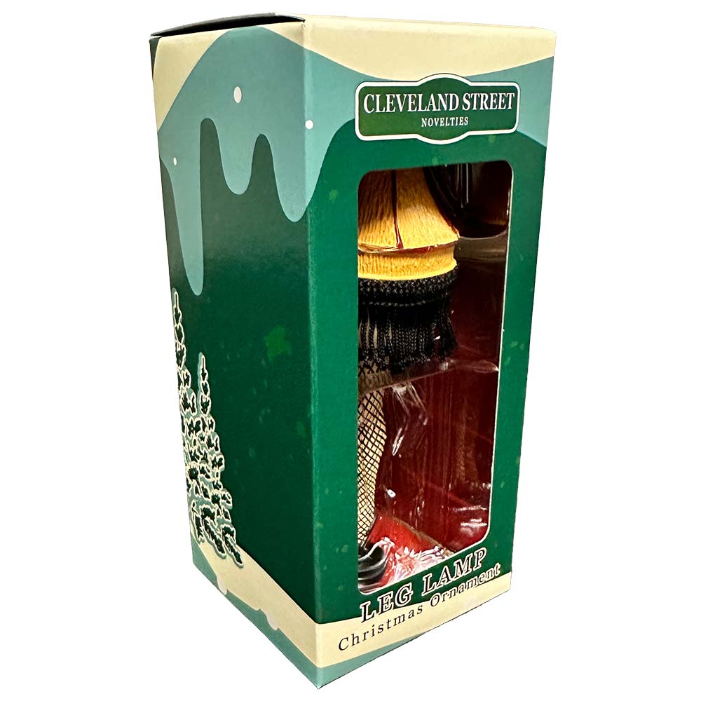 Christmas-themed leg lamp in packaging with 'Cleveland Street Novelties' branding.
