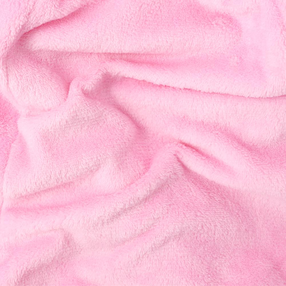 Close-up of the fabric of the christmas pink bunny suit. 