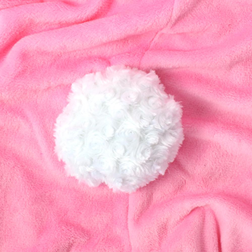 Close-up of the pink bunny costume fuzzy tail.