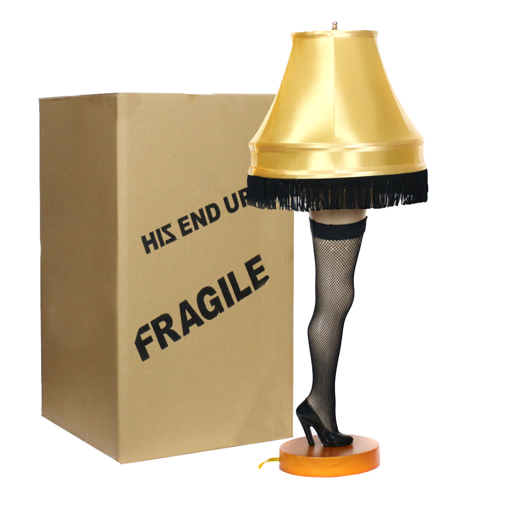 26 inch lamp next to a cardboard fragile box. Glorious old man's major award.